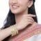 ZENEME Set Of 4 Gold-Plated Classic Paisley Shaped Textured Handcrafted Bangles - Image 2