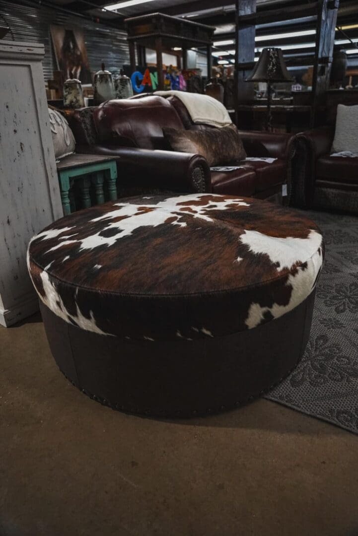 4822-Cowhide-ottoman-Coffee-table-scaled-1.jpeg Coffee table/Leather ottoman - Image 1